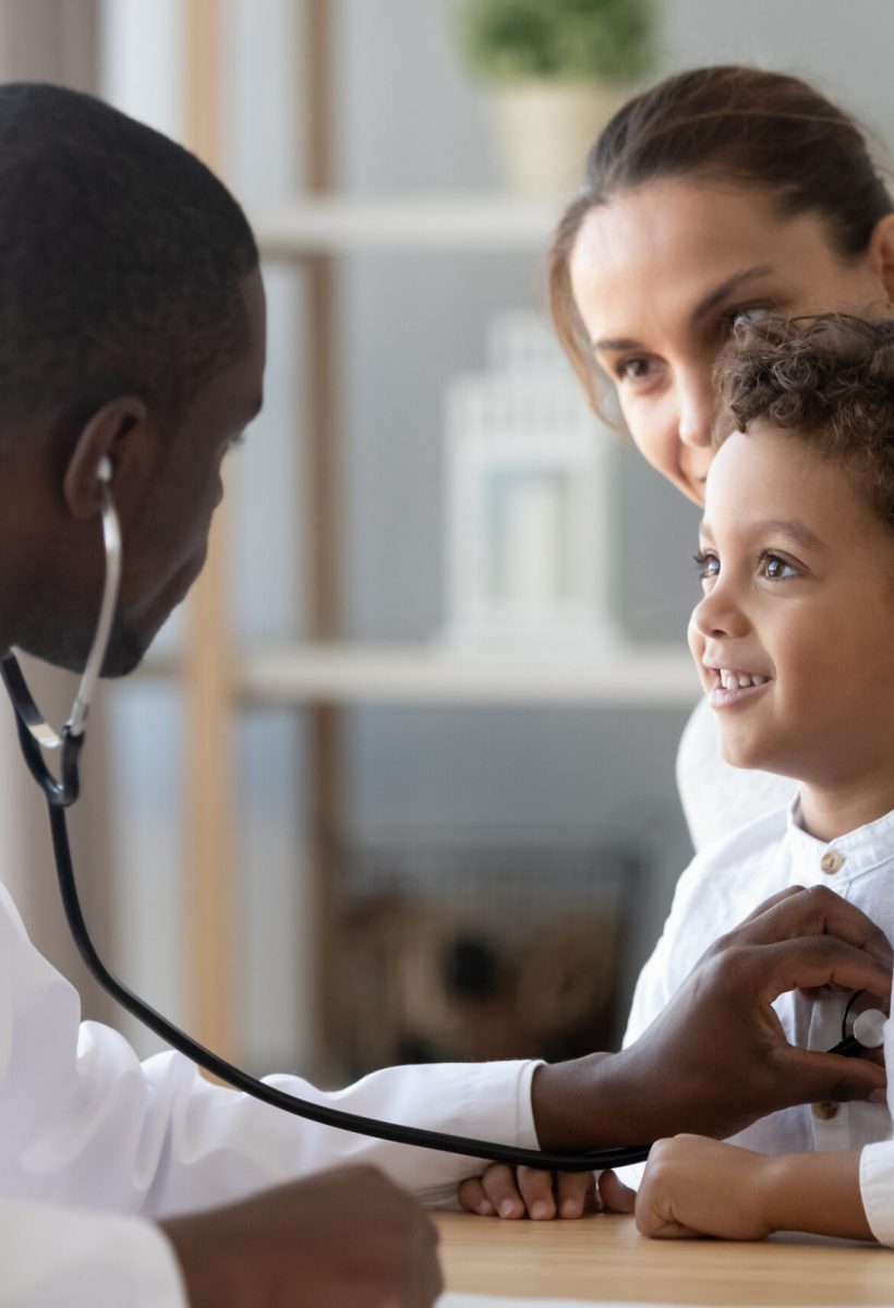 African,American,Male,Pediatrician,With,Stethoscope,Listening,To,Lung,And